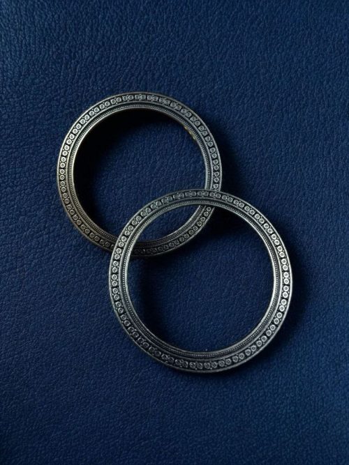 Oxidized silver plated ethnic bangle in German silver look-alike finish with traditional Indian design.