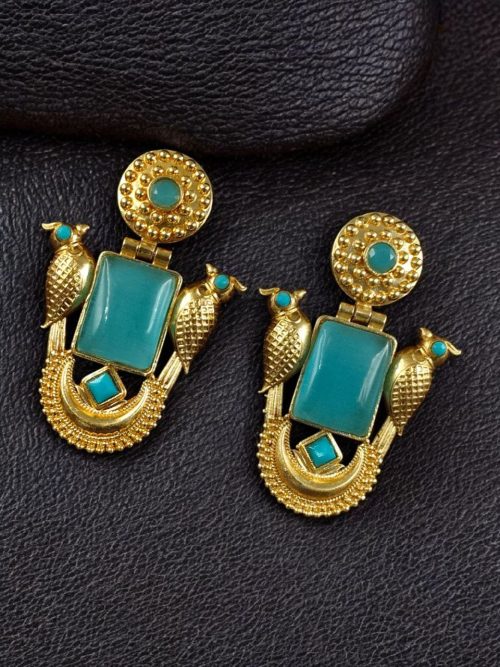 Traditional gold plated earrings with bird design and green stones in vintage style.