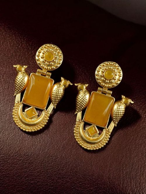 Traditional gold plated earrings with bird design and green stones in vintage style.