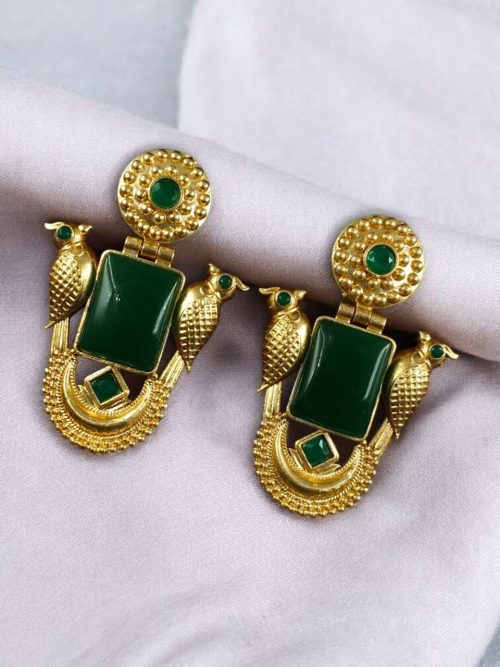 Traditional gold plated earrings with bird design and green stones in vintage style.