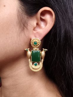 Traditional gold plated bird earrings with design and green stones in vintage style.