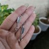 Heart arrow dangler earrings in German silver with hook for western casual wear.