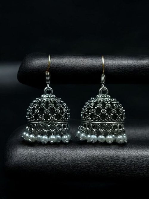 German silver jhumka earrings with pearl work and hook, ethnic dangler design.