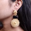 Gold plated flower dangler earrings with Monalisa stone vintage look.