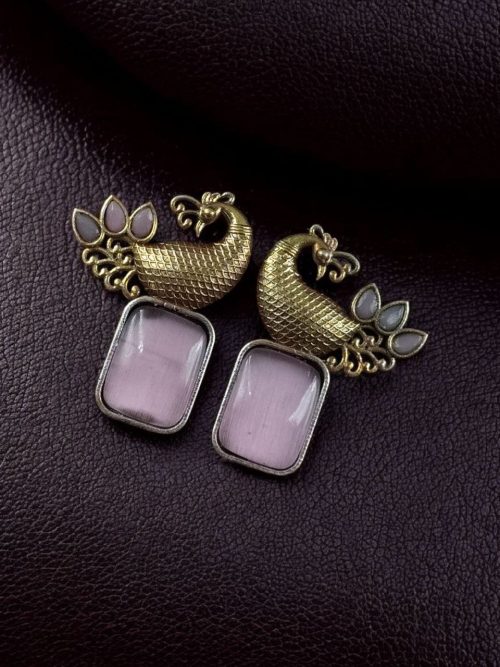 Two-tone peacock earrings with stone work in traditional look alike design.