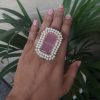 Gold plated adjustable ring with Monalisa stone and pearl work.