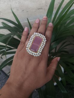 Gold plated adjustable ring with Monalisa stone and pearl work.