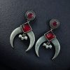 Silver replica half moon earrings with pearl and stone work