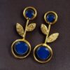 Gold plated floral art earrings with Monalisa stone and leaf design for ethnic and western wear.