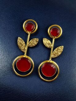Gold plated floral art western look earrings with Monalisa stone and leaf design for ethnic and western wear.