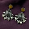 Traditional oxidized silver replica peacock earrings with pearl and stone work.