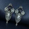 Traditional oxidized silver plated stud earrings with pearl and stone work