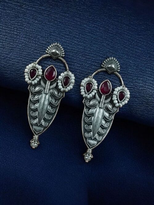 Traditional oxidized silver plated stud earrings with pearl and stone work