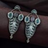 Traditional oxidized silver plated stud earrings with pearl and stone work