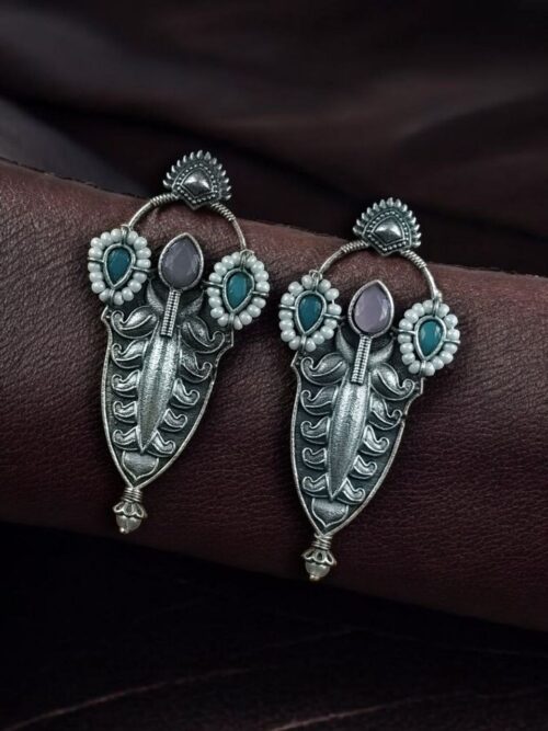 Traditional oxidized silver plated stud earrings with pearl and stone work
