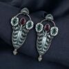 Traditional oxidized silver plated stud earrings with pearl and stone work