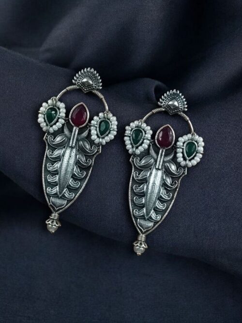 Traditional oxidized silver plated stud earrings with pearl and stone work