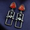 Geometric pearl dangler earrings in oxidized silver finish