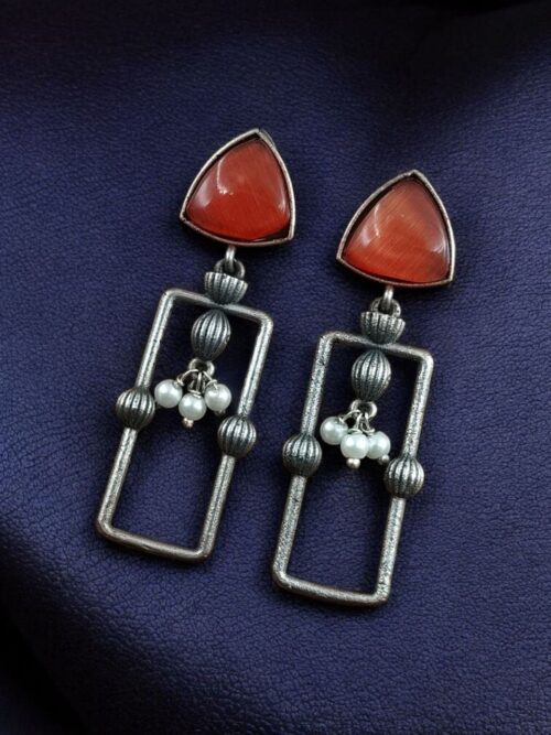 Geometric pearl dangler earrings in oxidized silver finish
