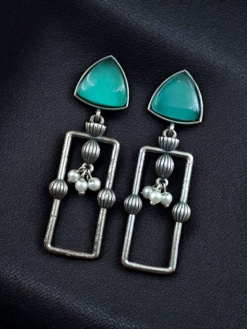 Geometric pearl dangler earrings in oxidized silver finish