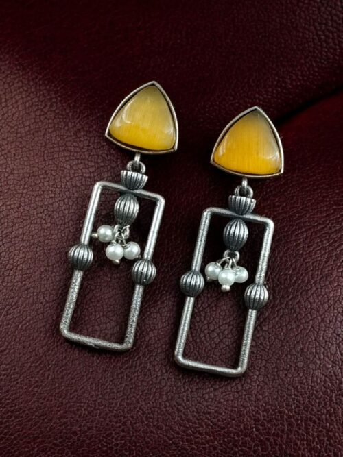 Geometric pearl dangler earrings in oxidized silver finish