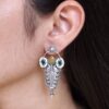 Traditional oxidized silver plated stud earrings with pearl and stone work