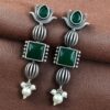 Antique silver lotus stud earrings with pearl and stone detailing