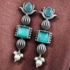 Antique silver lotus stud earrings with pearl and stone detailing