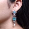 Antique silver lotus earrings with pearl and stone detailing