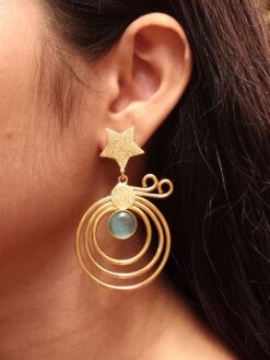 Gold plated star earrings with geometric stone dangler design.