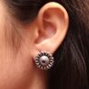 Silver replica flower stud earrings with stone design for daily wear.