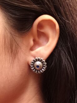 Silver replica flower stud earrings with stone design for daily wear.