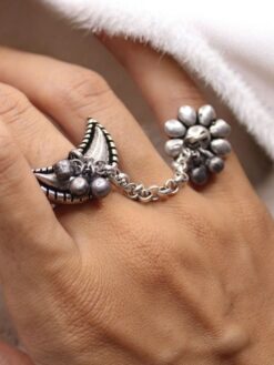 Silver plated half moon chain ring with flower and ghungroo design.