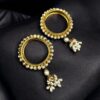 Traditional gold plated ethnic bangle with stone detailing.