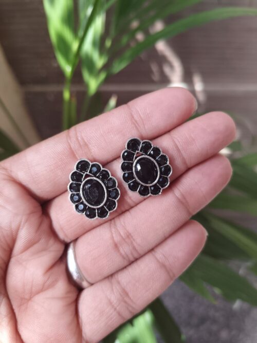 Silver replica stud earrings with stone work for daily wear.