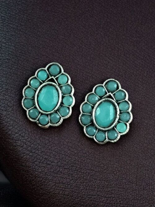 Silver replica stud earrings with stone work for daily wear.