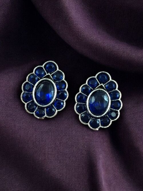 Silver replica stud earrings with stone work for daily wear.