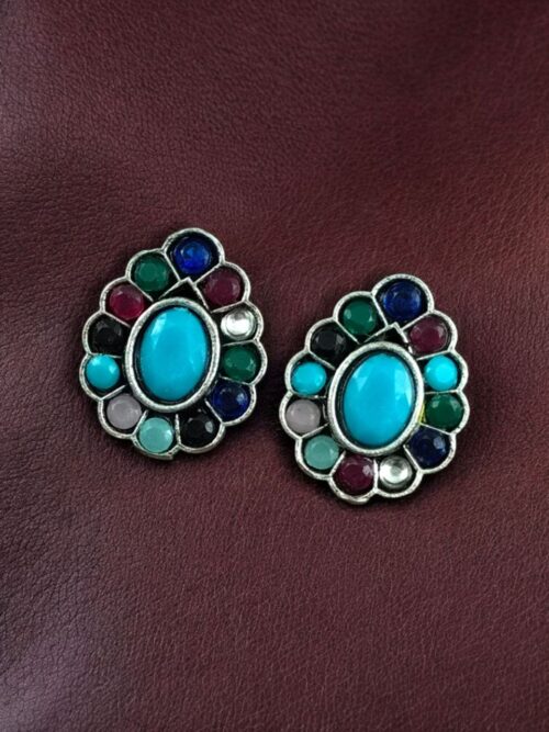 Silver replica stud earrings with stone work for daily wear.