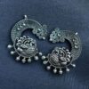 Oxidized silver replica peacock earcuff with ethnic design.