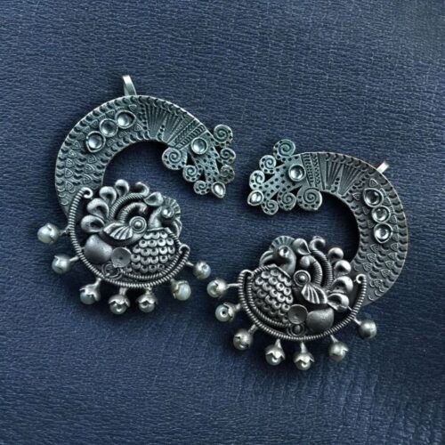 Oxidized silver replica peacock earcuff with ethnic design.