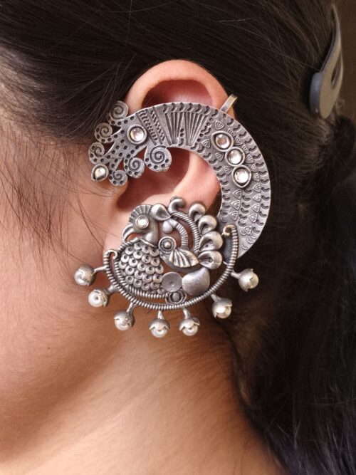 Oxidized silver replica peacock earcuff with ethnic design.