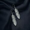Oxidised feather design German silver earrings for women.