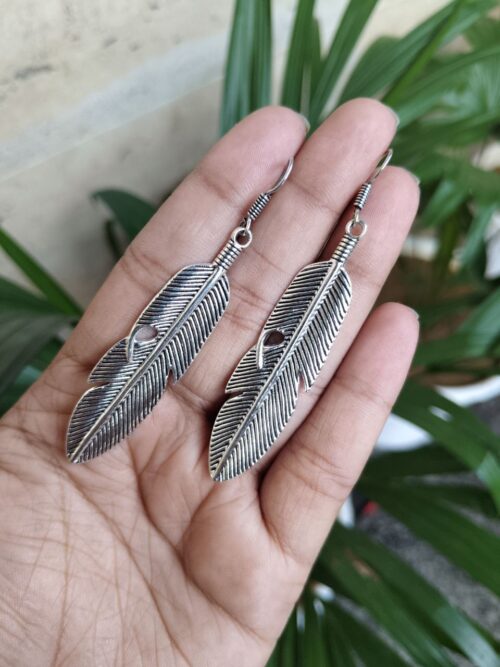 Oxidised feather design German silver earrings for women.