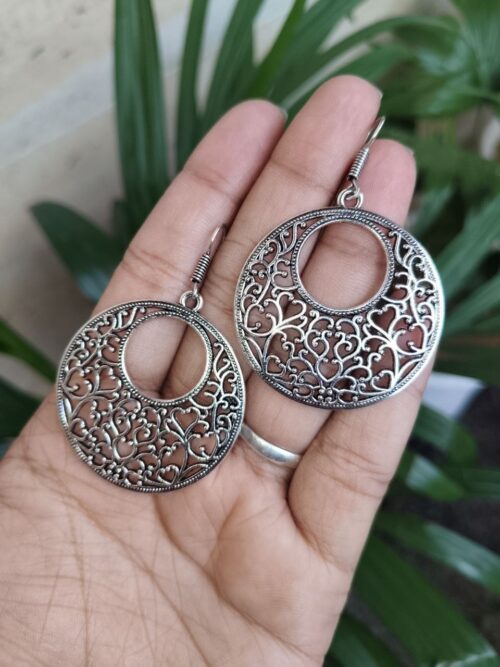 German silver floral art circle dangler earrings for women.