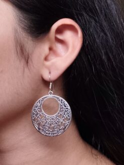 German silver floral art circle dangler earrings for women.