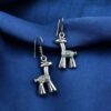 Oxidized giraffe design German silver earrings for girls.