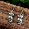 Handcrafted German silver owl earrings with vintage look.