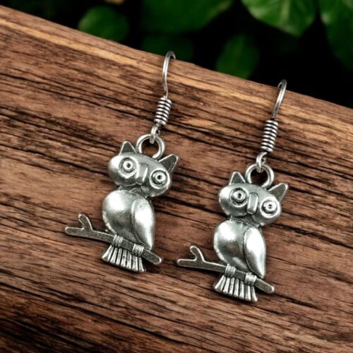 Handcrafted German silver owl earrings with vintage look.