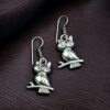Handcrafted German silver owl earrings with vintage look.