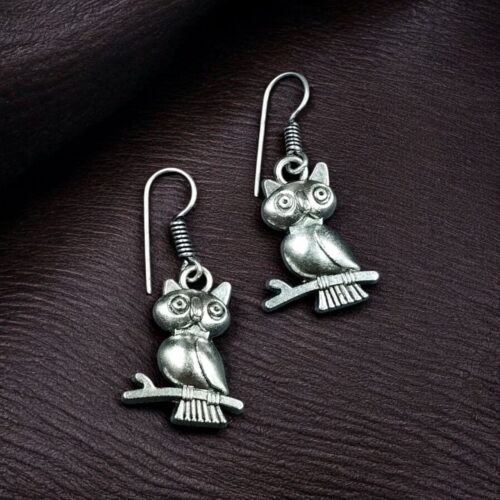 Handcrafted German silver owl earrings with vintage look.